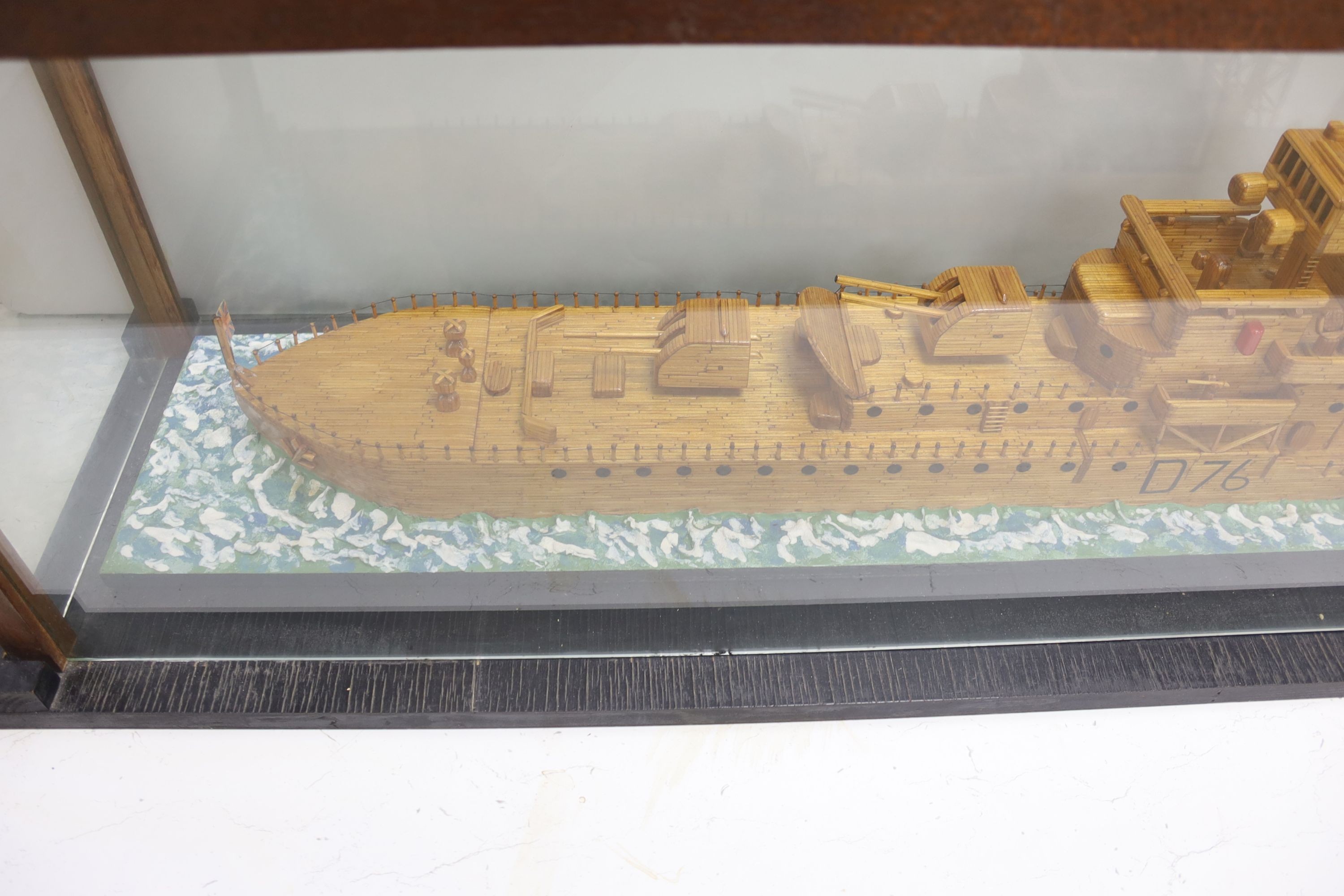 A large scratch built model of the destroyer HMS Consort (D76) made entirely out of matches, cased, 159cm total length